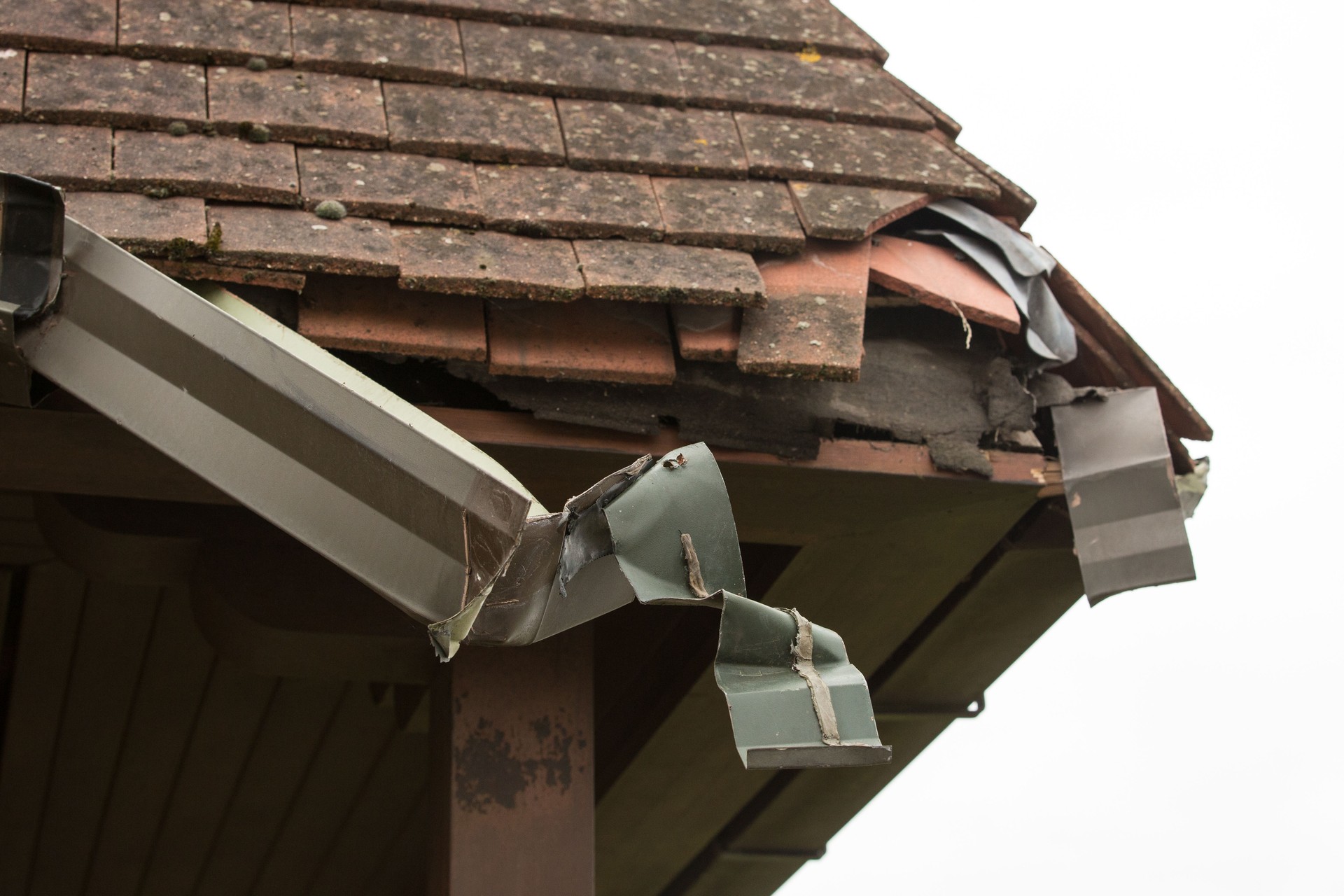 Storm damage to a residential property guttering and roof affected.